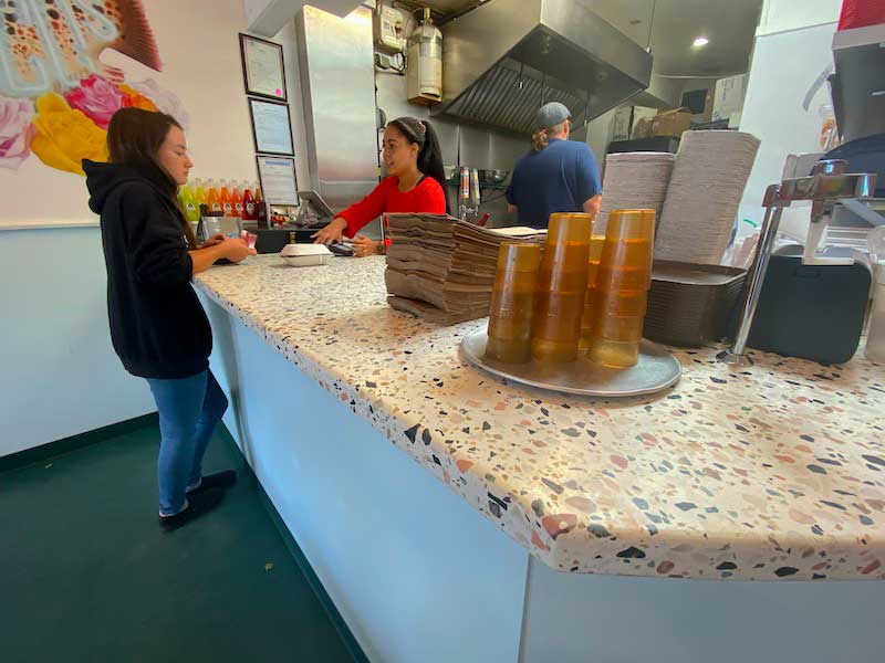 Terrazzo service counter with mixed aggregate.
