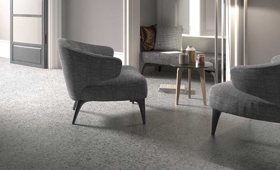 Soft residential room with terrazzo flooring.